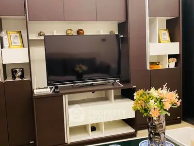 Modern living room with sleek TV unit and elegant decor