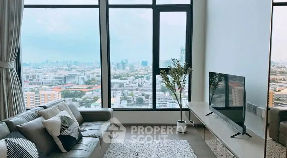 Modern living room with panoramic city view and stylish decor
