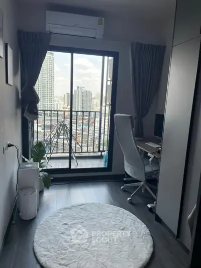 Modern study room with balcony view in high-rise apartment