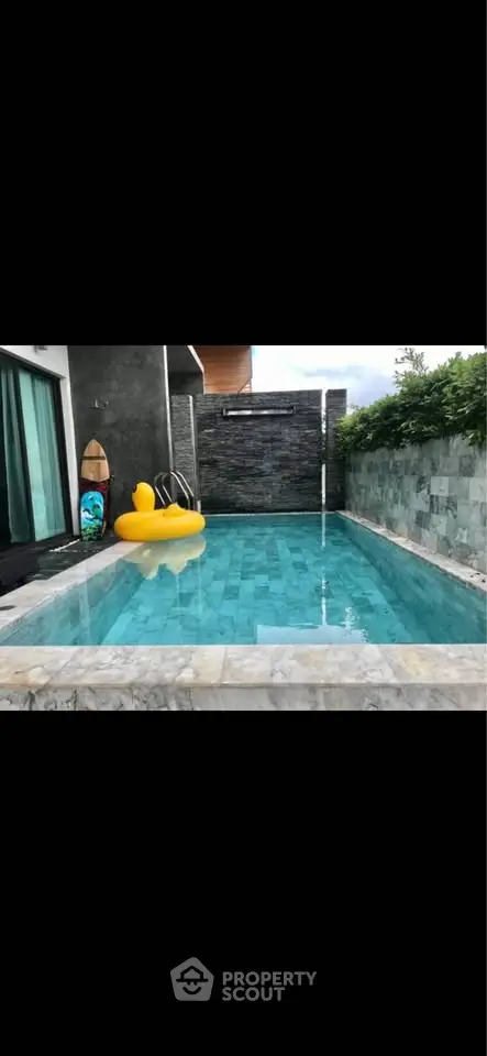 Luxurious private pool with modern design and relaxing ambiance, perfect for leisure and entertainment.