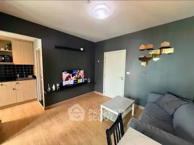 Modern living room with sleek design and open kitchen layout