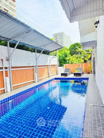 Luxurious private pool area with modern design and serene surroundings.