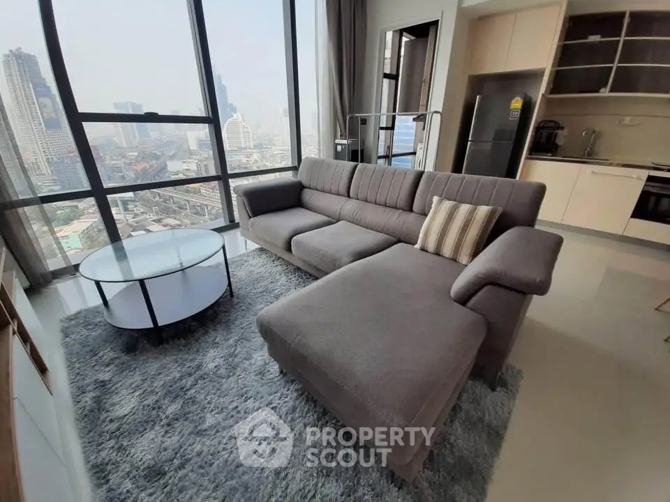 Modern living room with panoramic city view and stylish furniture