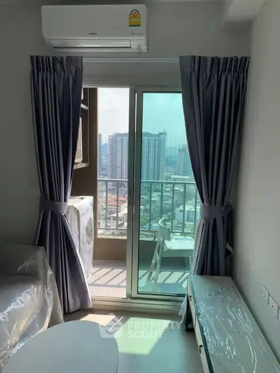 Modern apartment living room with balcony and city view, featuring air conditioning and stylish curtains.
