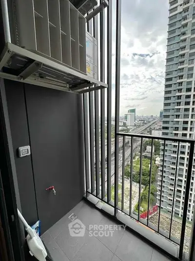 High-rise balcony with city view and modern design