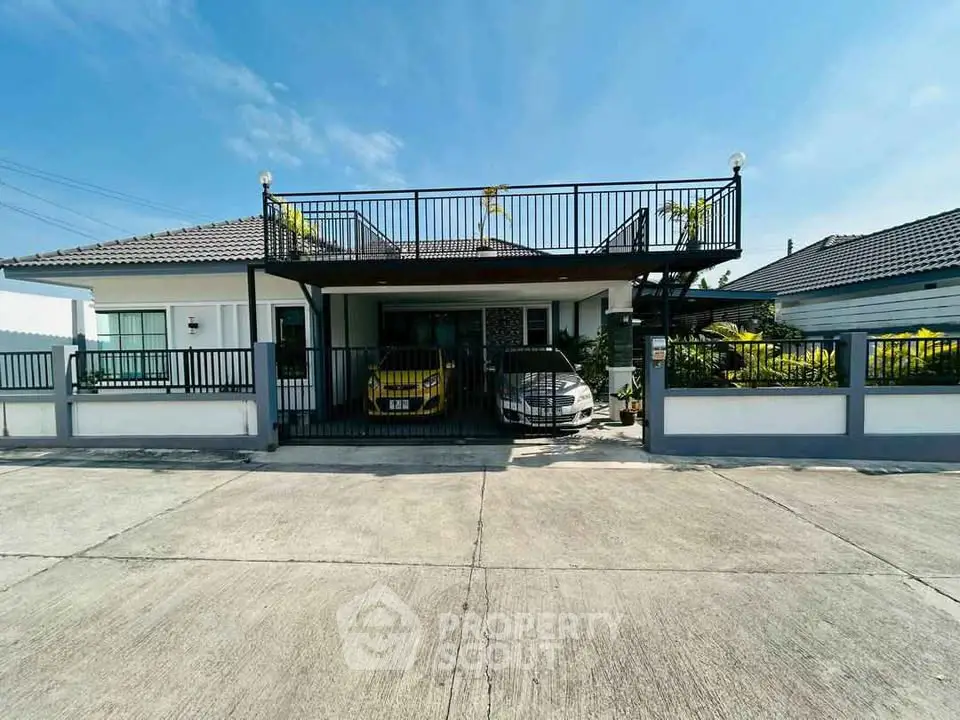 Charming single-story home with rooftop terrace and dual carport in a serene neighborhood.