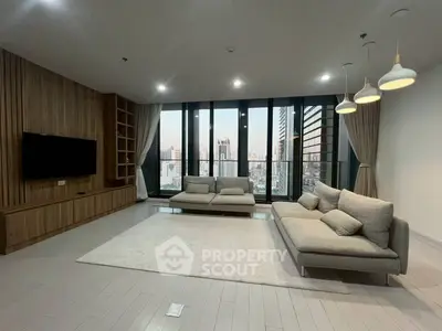 Spacious modern living room with city view and elegant furnishings