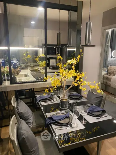 Modern dining area with elegant decor and stylish lighting