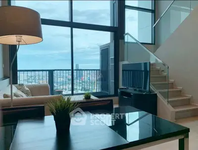 Modern living room with stunning city view and stylish decor