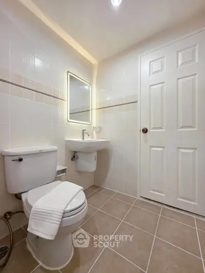 Modern bathroom with sleek fixtures and ambient lighting