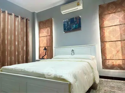 Cozy bedroom with elegant decor and natural light