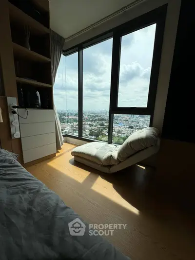 Cozy bedroom with panoramic city view and modern furnishings