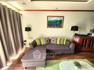 Charming living room with cozy sectional sofa and vibrant decor accents