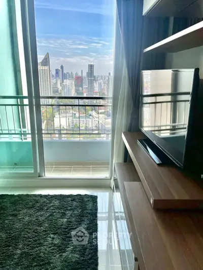 Modern living room with city view and balcony access