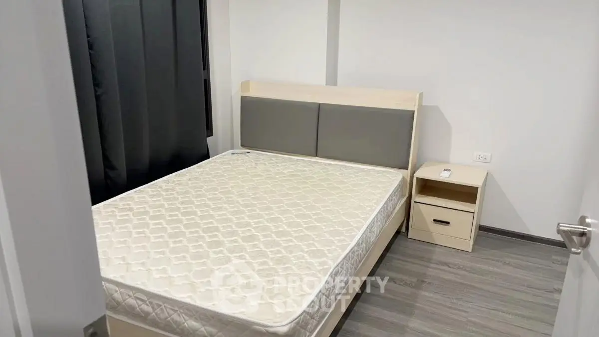 Modern minimalist bedroom with sleek design and neutral tones