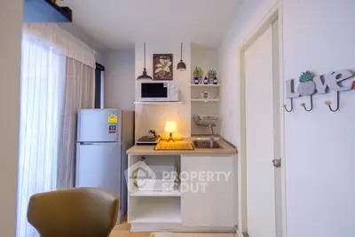 Cozy kitchen with modern appliances and stylish decor