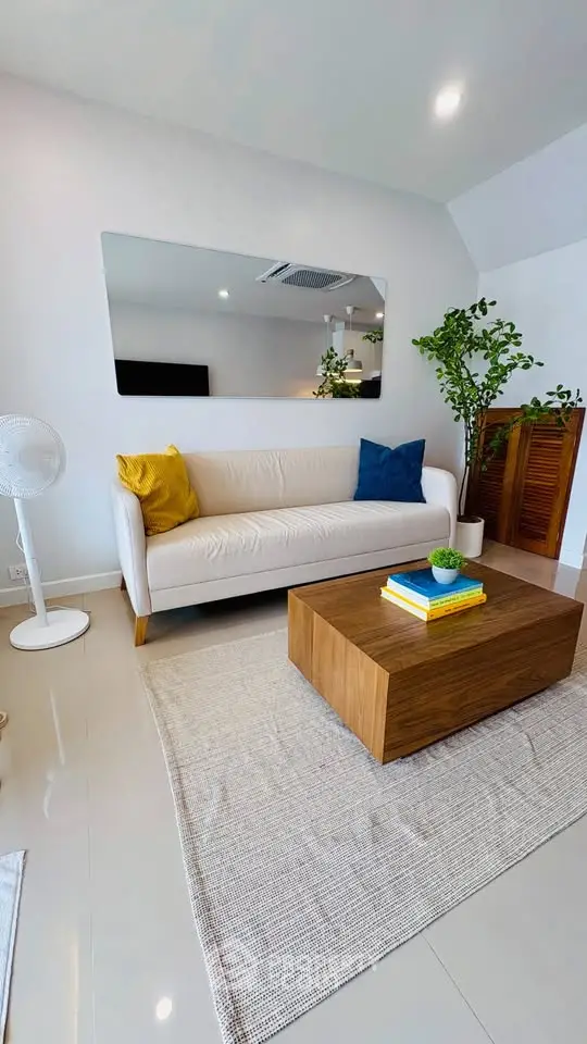 Modern living room with stylish decor and cozy seating area