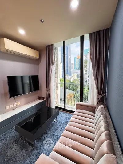 Modern living room with city view, plush sofa, and wall-mounted TV in a high-rise apartment.