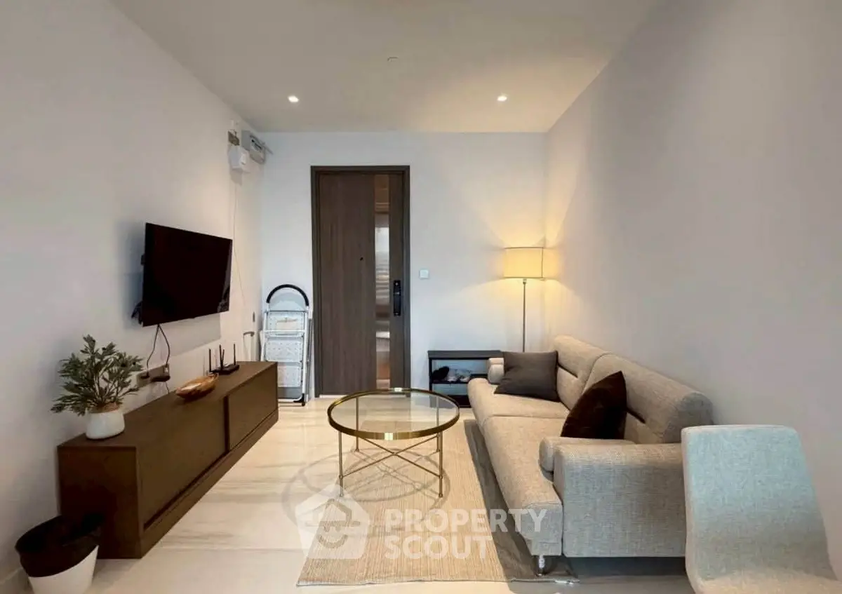 Modern living room with sleek furniture and ambient lighting