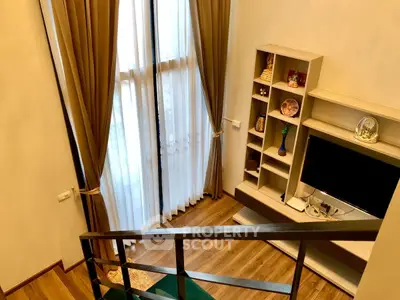 Stylish living room with modern decor and large windows for natural light