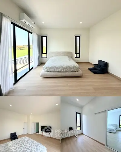 Spacious bedroom with large windows and modern minimalist decor, offering serene views and ample natural light.