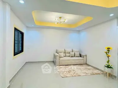 Modern minimalist living room with cozy sofa and elegant lighting