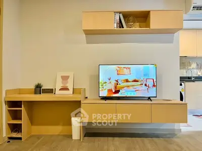 Modern living room with sleek TV unit and stylish decor