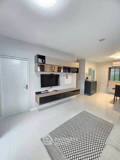 Modern living room with sleek TV unit and stylish decor