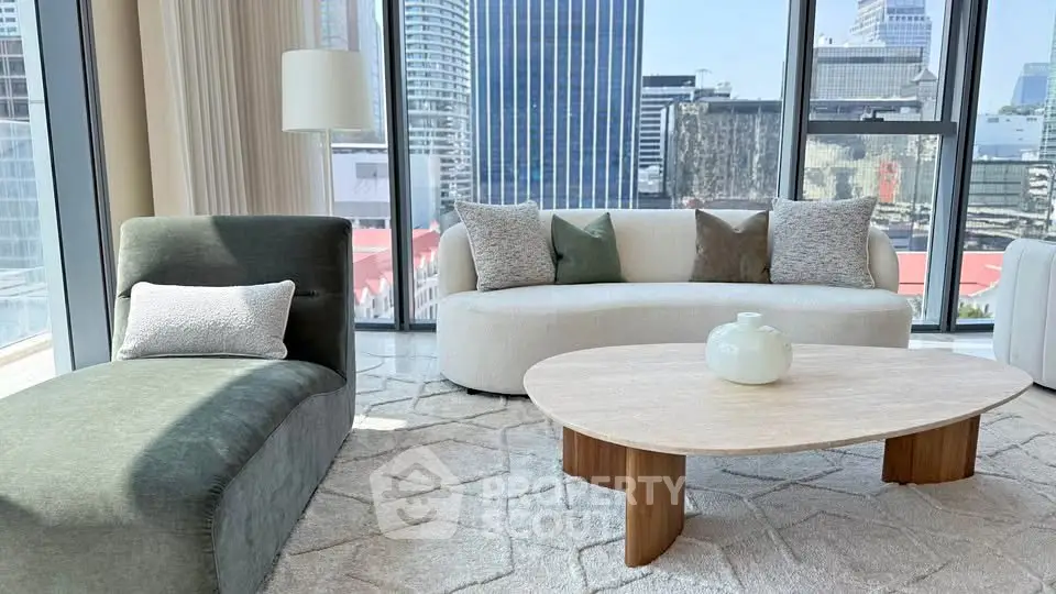 Luxurious modern living room with city view, elegant furniture, and natural light.