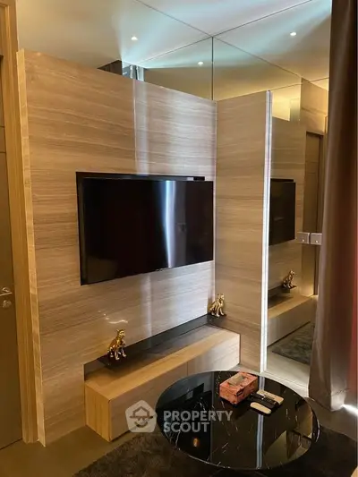 Modern living room with sleek TV setup and elegant decor