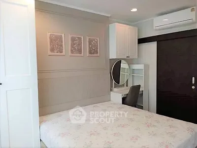 Cozy bedroom with elegant decor and built-in storage solutions