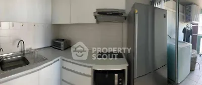 Modern kitchen with sleek appliances and ample counter space