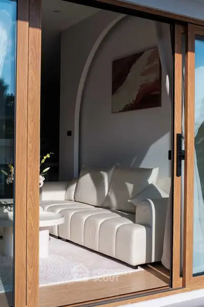 Luxurious living room with modern white sofa and elegant decor