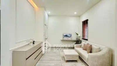 Elegant living room with modern decor and cozy seating area.
