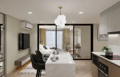 Modern open-plan kitchen and living area with sleek design and natural light.