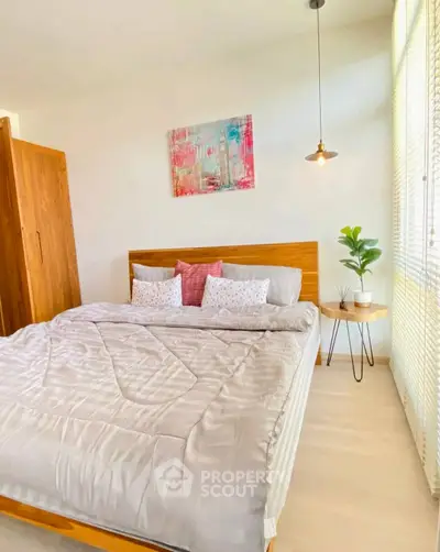 Cozy and stylish bedroom with modern decor and natural light