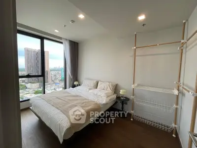 Modern bedroom with city view and minimalist design