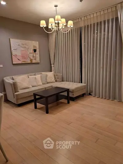 Elegant living room with modern decor and cozy ambiance