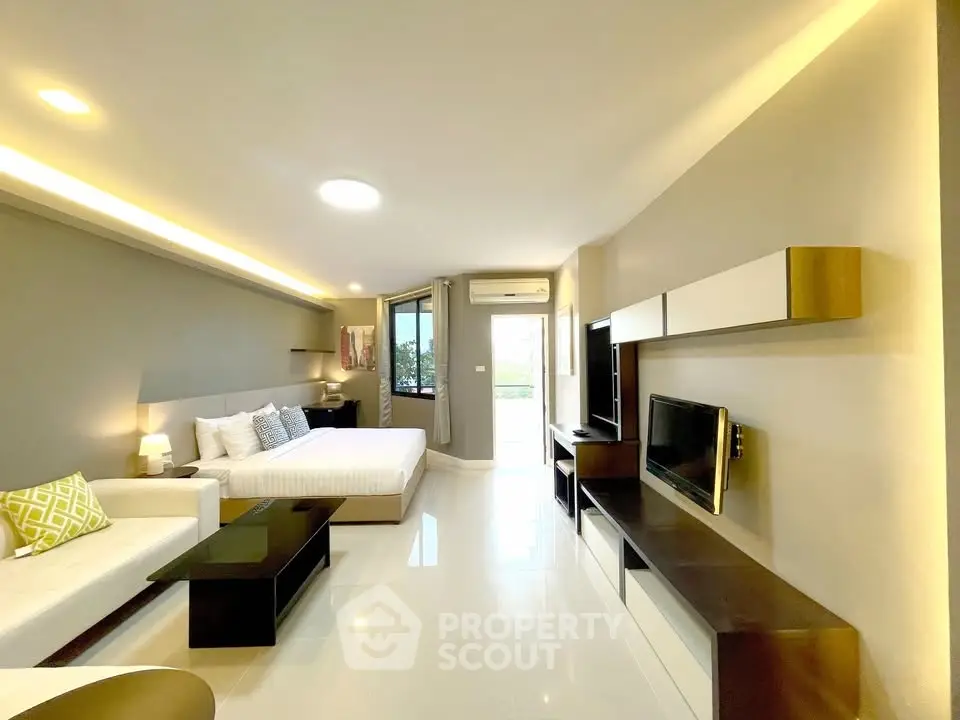 Spacious modern living room with sleek design and natural light