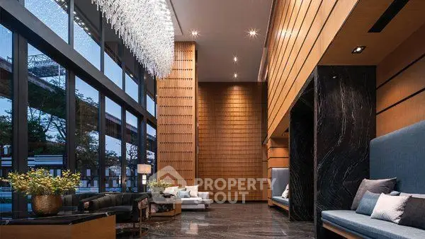 Luxurious modern lobby with high ceilings and elegant decor