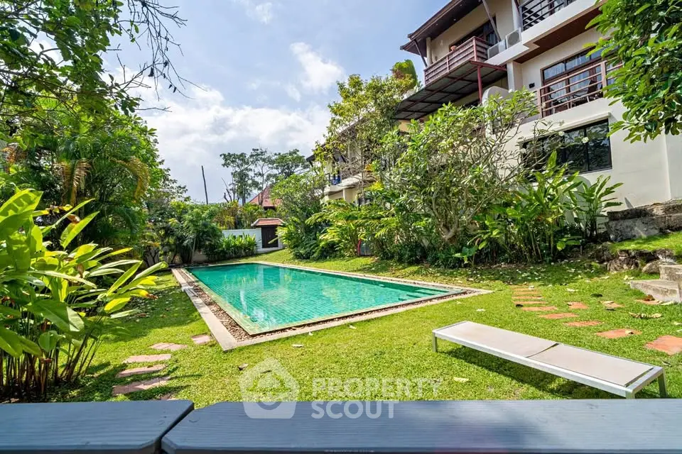 Luxurious villa with private pool and lush garden, perfect for relaxation and entertaining.