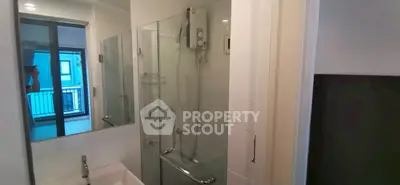 Modern bathroom with glass shower and sleek design