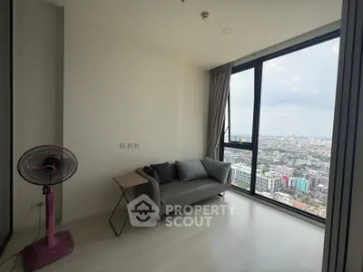 Modern living room with panoramic city view and minimalist decor