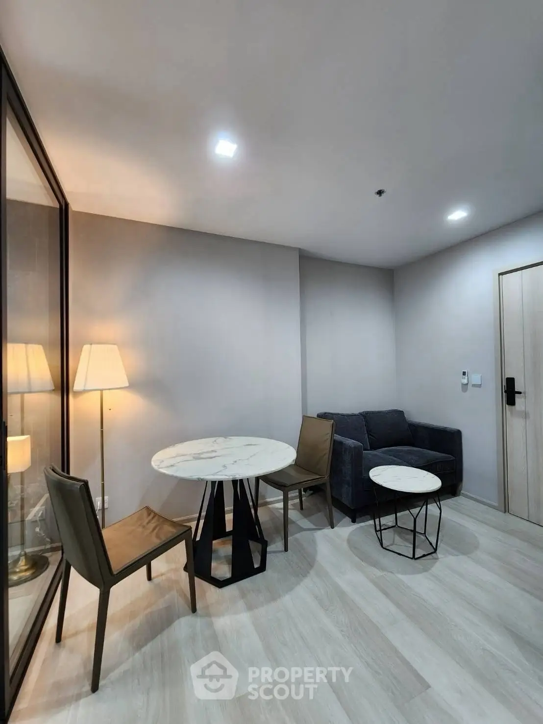 Modern living room with stylish furniture and ambient lighting