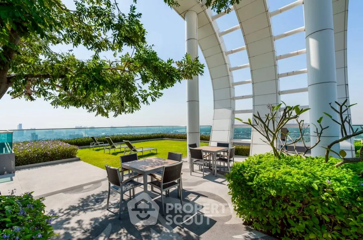 Luxurious rooftop garden with stunning city views and modern outdoor seating.