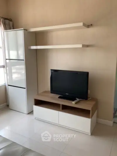 Modern living room with sleek TV stand and shelving unit