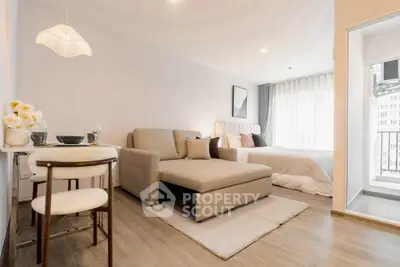 Modern studio apartment with cozy living area and stylish decor