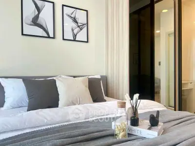 Modern bedroom with stylish decor and cozy bedding