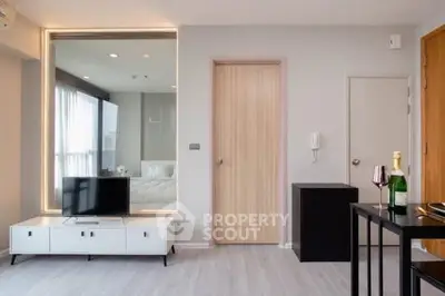 Modern living room with sleek furniture and ambient lighting