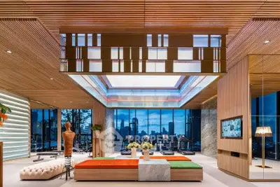Luxurious modern living room with panoramic city view and stylish decor